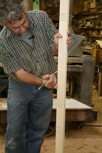 Stand the story pole up on the subfloor at the bottom tread location, and mark the location of the laser line.